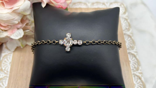 Cross bracelet with center 8mm crystal set in antique brass